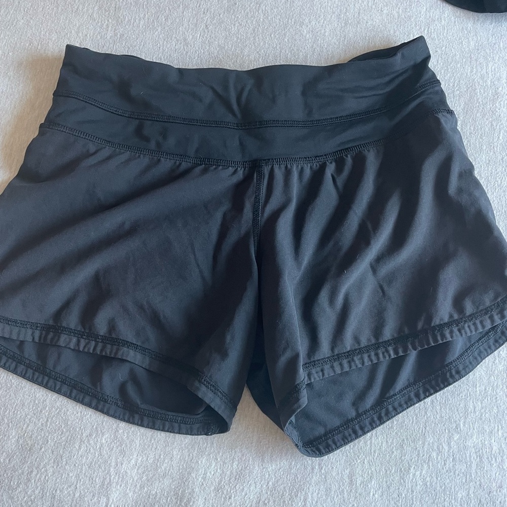 All black lined Lululemon running shorts
